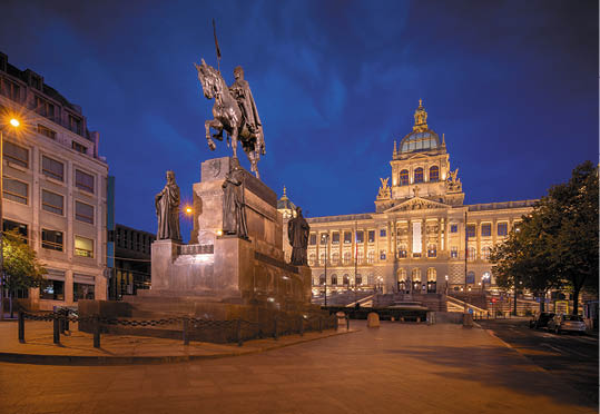 Wenceslas Square with equestrian statue of saint Vaclav in front of National Museum during the night in Prague, Czech Republic (Czechia), Europe