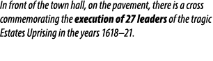 In front of the town hall, on the pavement, there is a cross commemorating the execution of 27 leaders of the tragic ...