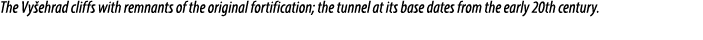 The Vy ehrad cliffs with remnants of the original fortification; the tunnel at its base dates from the early 20th cen...